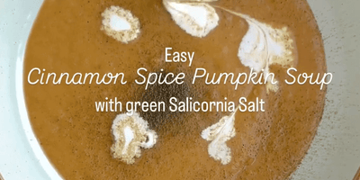 Healthy Cinnamon spice pumpkin soup with green salt